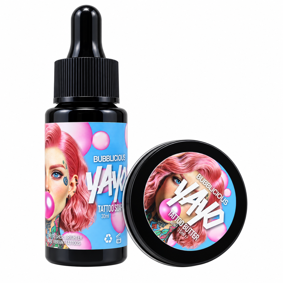 A bottle and a round tin of Yayo Bubblicious Tattoo Slick 2mm tattoo solution, featuring a vibrant pink and blue label with a graphic of a woman with pink hair blowing a bubblegum bubble.