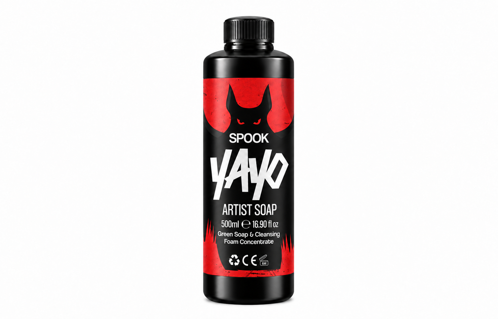 A 500ml black bottle of Spook Yayo Artist Soap, featuring a bold red and black label with a stylized cat silhouette and white text, set against a plain white background.