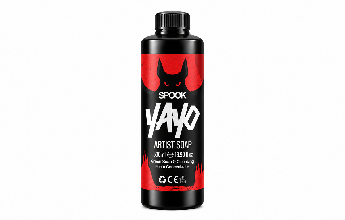 A 500ml black bottle of Spook Yayo Artist Soap, featuring a bold red and black label with a stylized cat silhouette and white text, set against a plain white background.